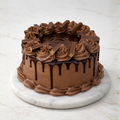 Chocolate Rosette Bliss cake with delicate rosette piping and rich chocolate layers - Toromi Bakehouse